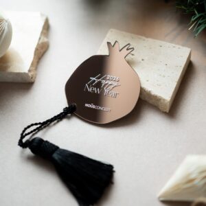Pomegranate Logo Charm | Bronze Plexiglass Mirror